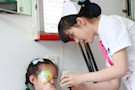 区残联与爱尔眼科为20名贫困、留守儿童赠送公益眼镜